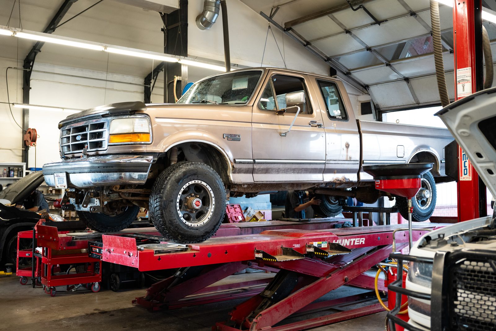 Classic Ford truck on the Hunter alignment rack at Kalispell Alignment and Auto Repair